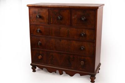 Appraisal: A Victorian mahogany chest of drawers with a shaped apron