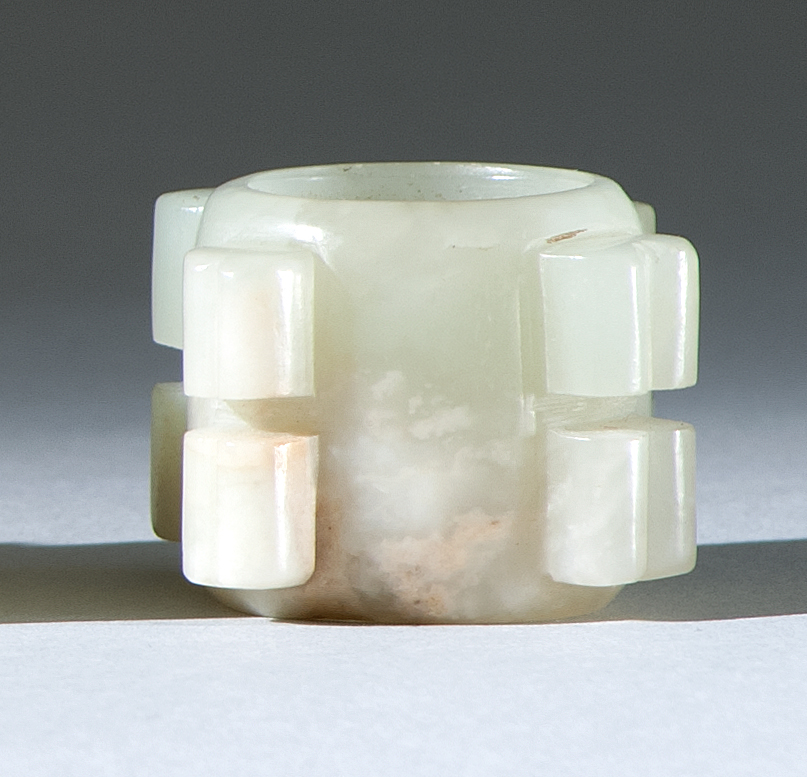 Appraisal: CELADON JADE ZUN th CenturyIn cylinder form with raised carving