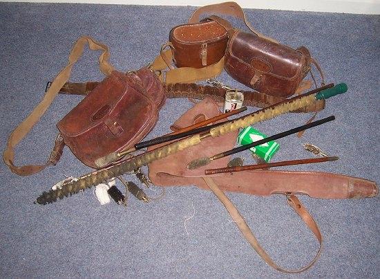 Appraisal: A leather gun slip various cartridge case belts etc