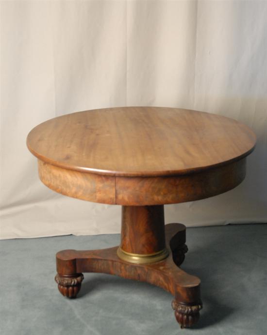 Appraisal: An American Classical Mahogany Center Table having a round top