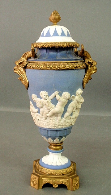 Appraisal: - Fine blue Wedgwood covered urn c with relief putti