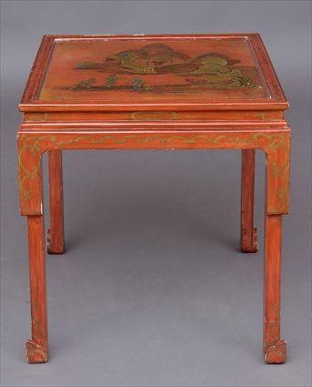 Appraisal: CHINOISERIE RED LACQUER LOW TABLE The paneled top with relief