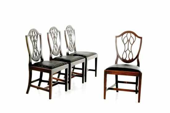 Appraisal: Georgian carved mahogany shieldback side chair set circa latticework back