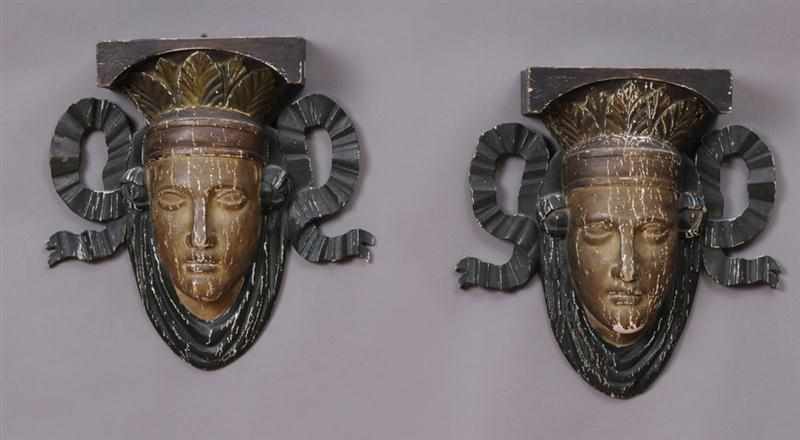 Appraisal: PAIR OF EMPIRE STYLE CARVED PAINTED MASK-HEAD WALL LIGHTS Each