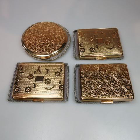 Appraisal: Four German Gold Tone Metal Compacts s new old stock