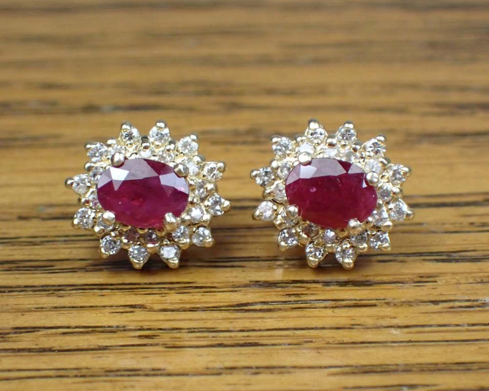 Appraisal: PAIR OF RUBY AND DIAMOND STUD EARRINGS each k yellow