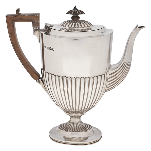 Appraisal: A Victorian silver coffee pot shield shaped and partly reeded