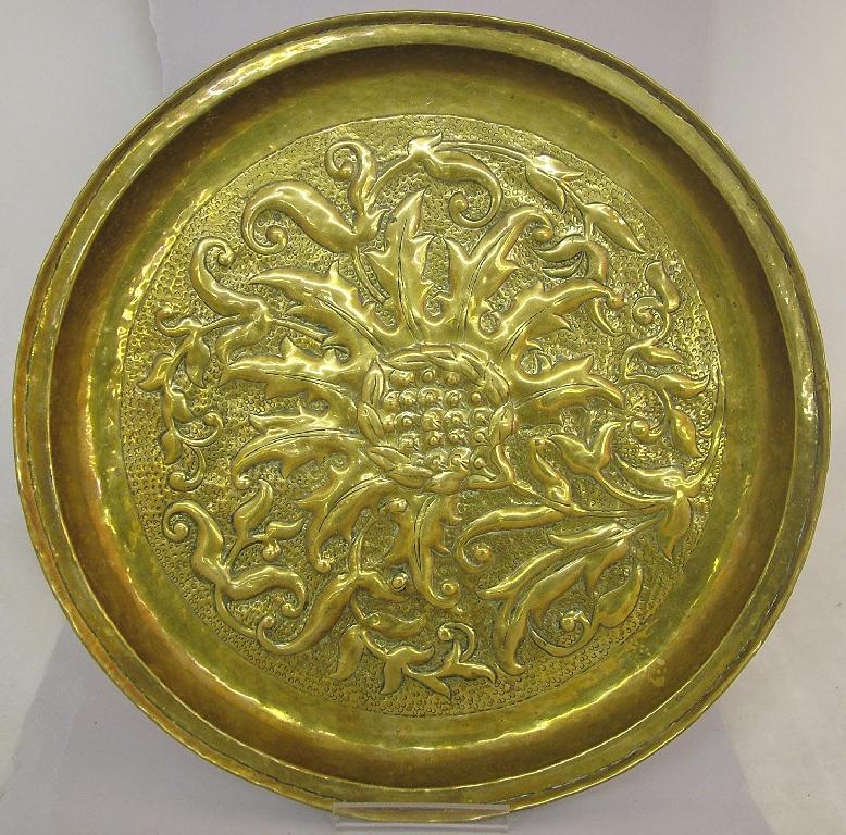 Appraisal: W H Mawson Keswick circular brass charger embossed with sea