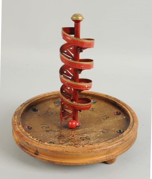 Appraisal: Spiral Marble Game Wooden board walnut with three spherical feet