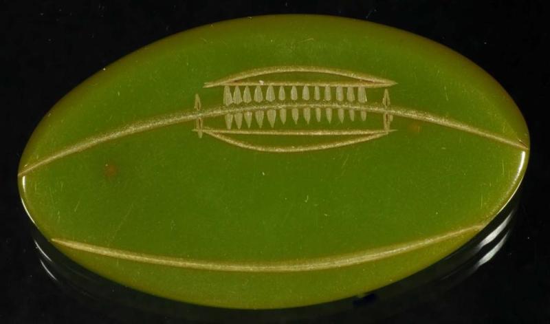 Appraisal: Bakelite Green Football Pin Condition Excellent Size - L