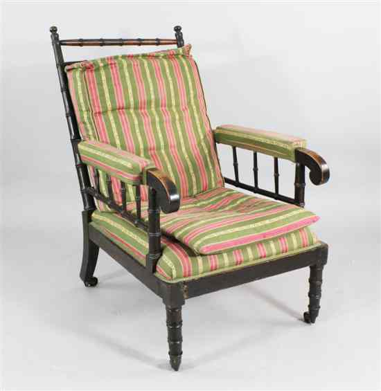 Appraisal: A Regency simulated bamboo armchair with striped fabric upholstered cushions