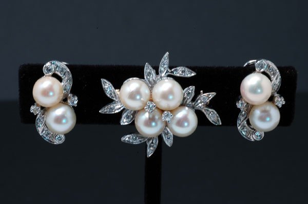 Appraisal: Pearl and diamond brooch and ear clips Brooch of unmarked