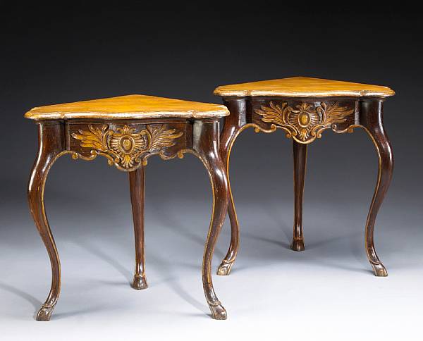 Appraisal: A pair of Italian Rococo style parcel gilt painted corner