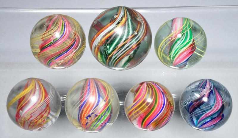 Appraisal: Lot of Multi-Color Swirl Marbles Description Includes six divided core