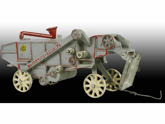 Appraisal: Cast Iron Arcade McCormick Deering Combine Toy Description Large gray