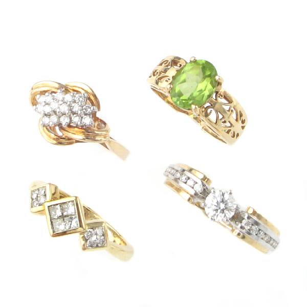 Appraisal: A collection of diamond peridot and gold rings thirty-five rings