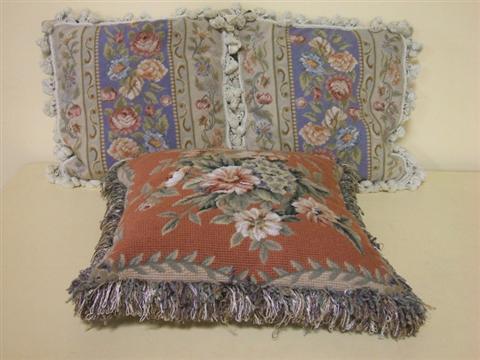 Appraisal: PAIR OF AUBOUSSON STYLE NEEDLEPOINT PILLOWS Stitched with a cream