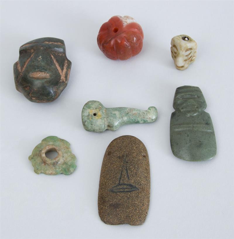 Appraisal: GROUP OF INDONESIAN AND OCEANIC CARVED STONE PENDANTS Largest x