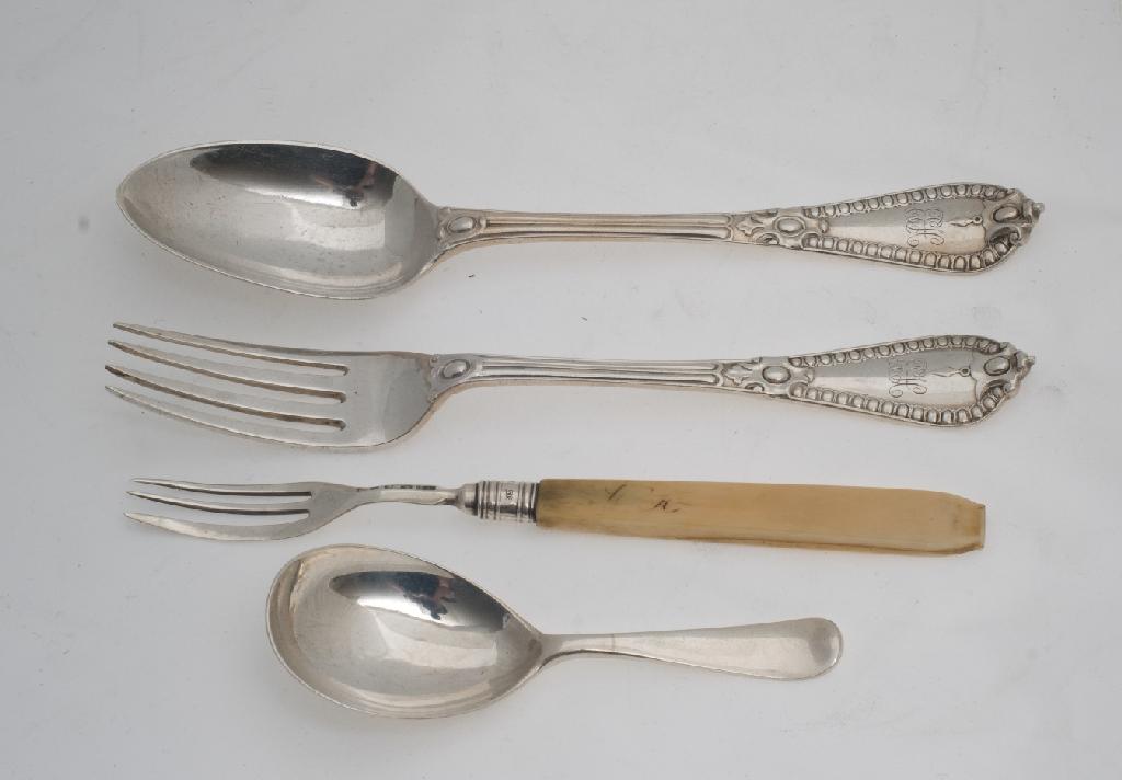 Appraisal: VICTORIAN SILVER RAT-TAIL CADDY SPOON BIRMINGHAM together with a Victorian