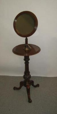 Appraisal: A VICTORIAN SHAVING STAND the circular plate within a moulded