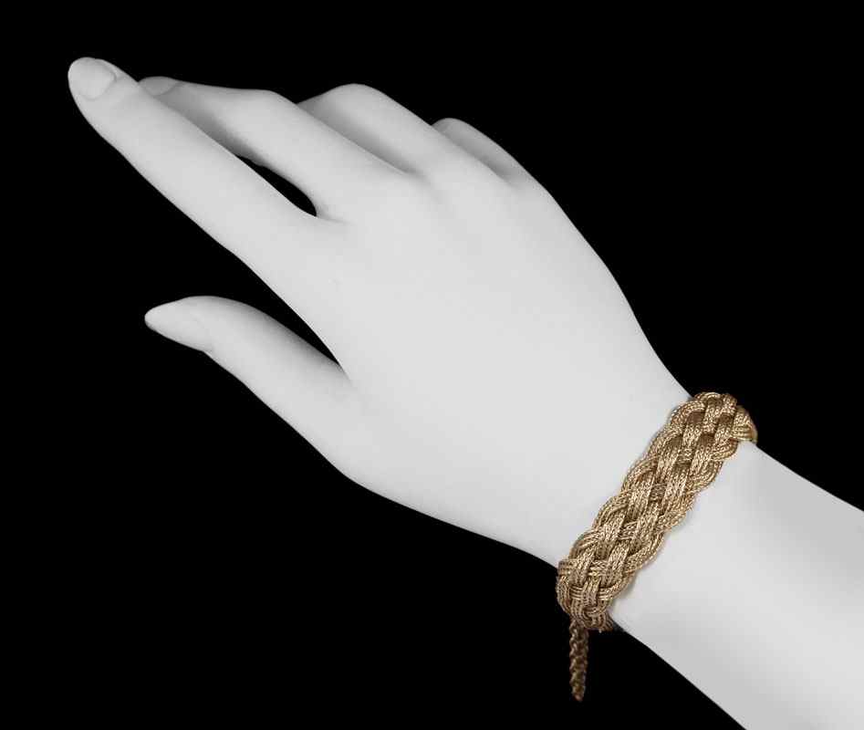 Appraisal: K GOLD WEAVE BRACELET K yellow gold bracelet Braided mesh