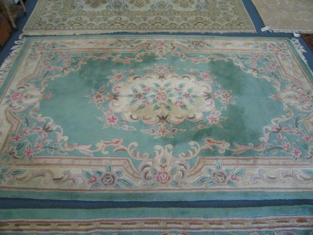 Appraisal: Chinese Handmade Sculptured Wool Rug floral with green ivory field