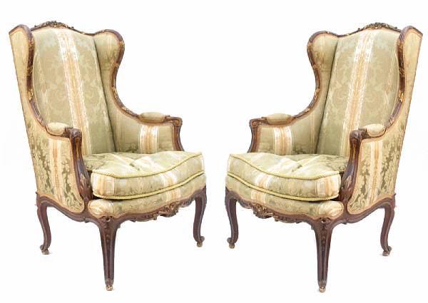 Appraisal: A pair of Louis XV style parcel gilt walnut armchairs