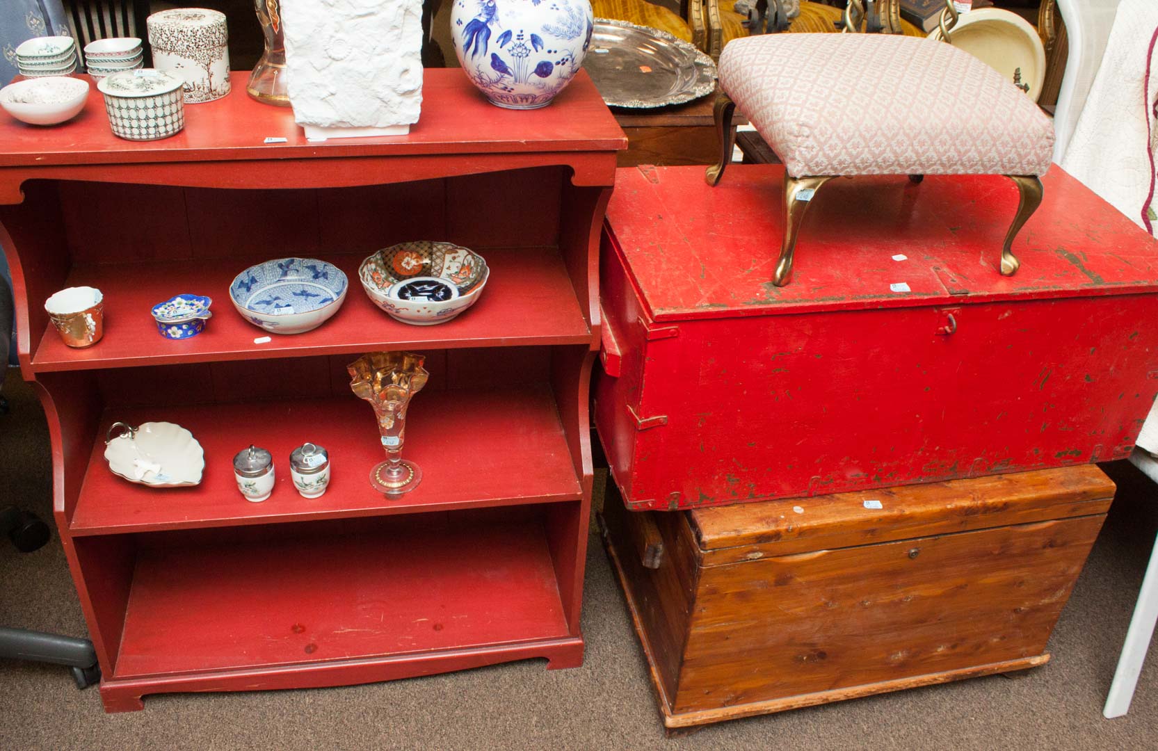 Appraisal: Four pieces of furniture including two trunks painted book shelf