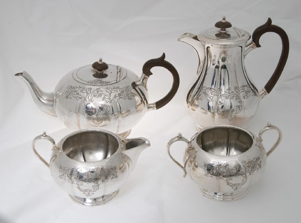 Appraisal: EARLY th CENTURY SILVER-PLATED FOUR-PIECE TEA SERVICE comprising teapot hot