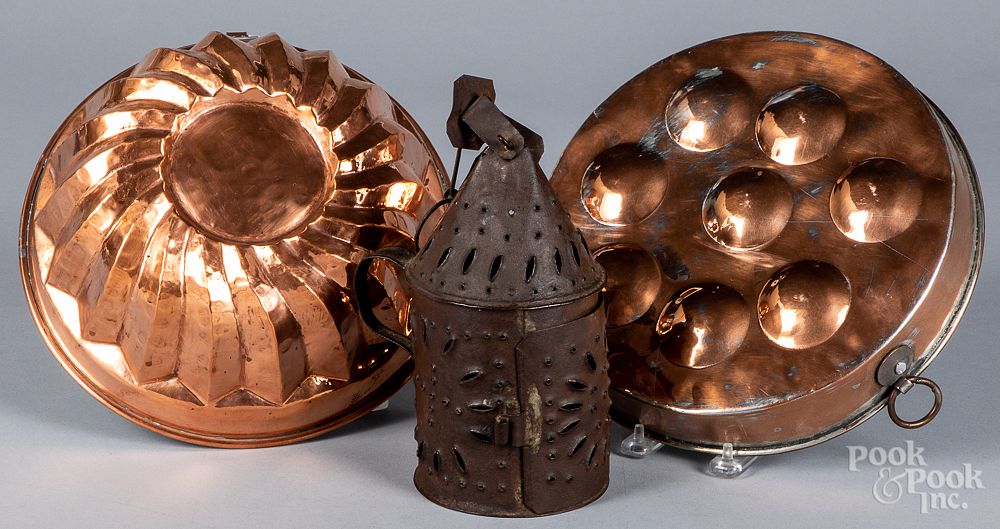 Appraisal: Two copper pan molds together with a tin lantern Two