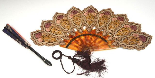 Appraisal: A MIDDLE EASTERN NINE FOLD NEEDLEWORK FAN with simulated tortoiseshell