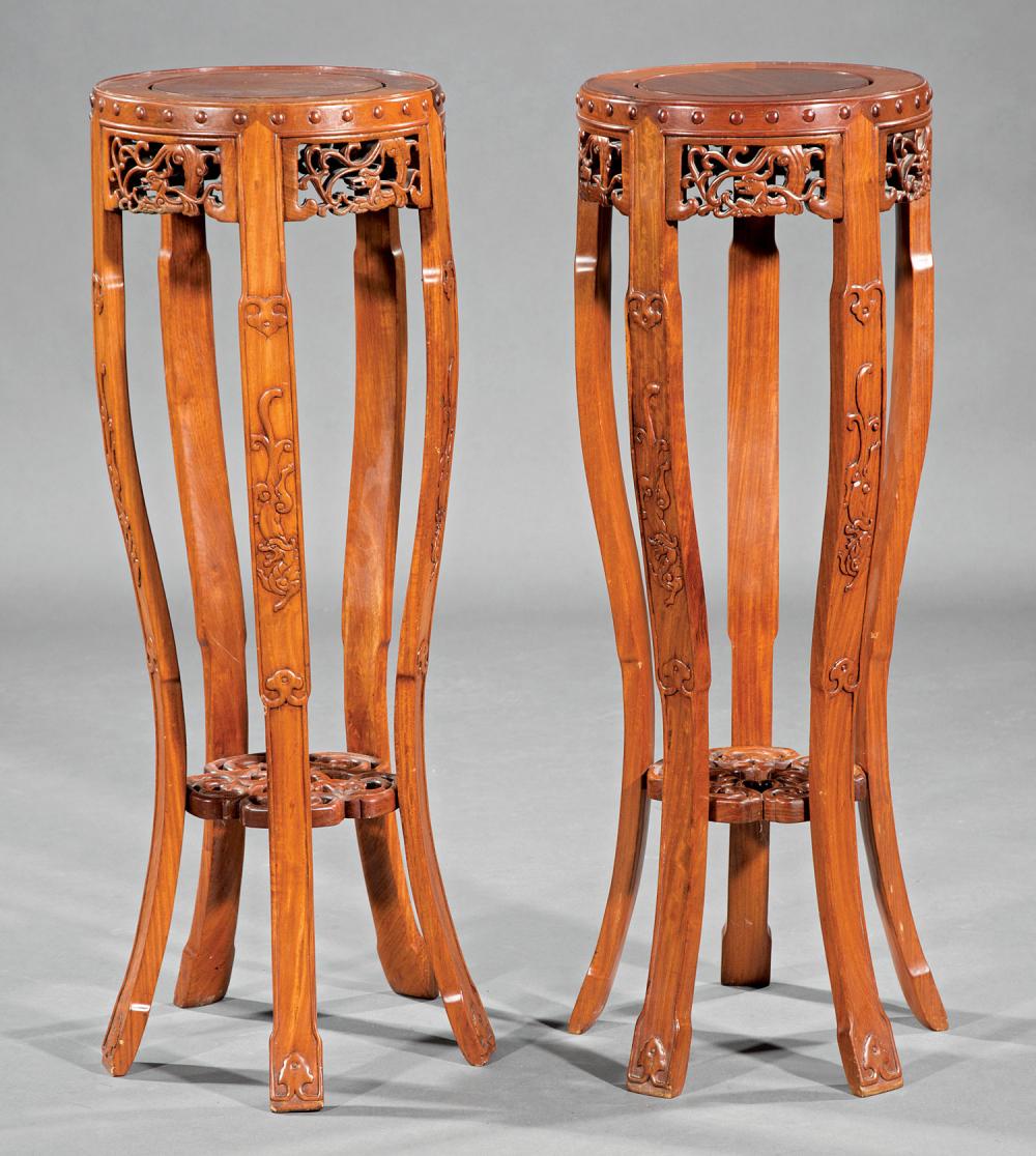 Appraisal: Pair of Chinese Hardwood Plant Stands inset circular top openwork