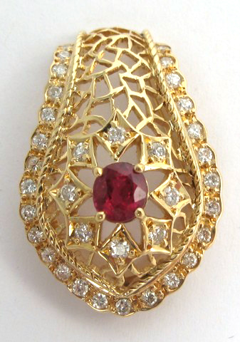 Appraisal: RUBY DIAMOND AND FOURTEEN KARAT GOLD PENDANT set with an