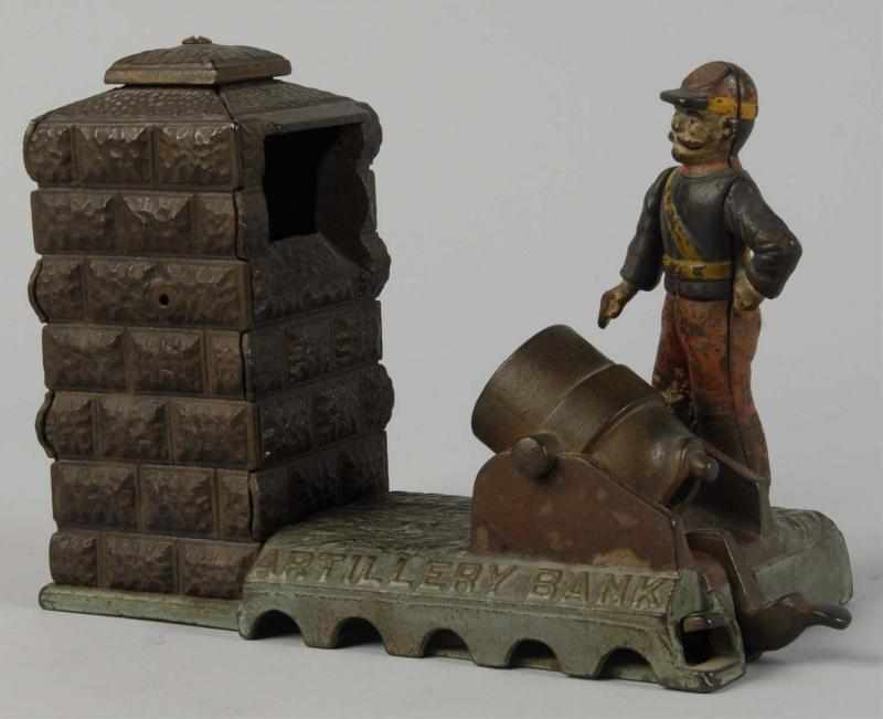 Appraisal: Cast Iron Artillery Mechanical Bank Description Working Figure is broken