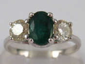 Appraisal: An carat white gold emerald and diamond three stone ring