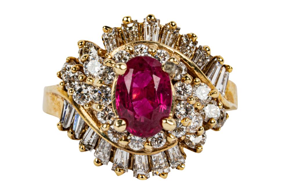 Appraisal: KARAT YELLOW GOLD DIAMOND RUBY RINGcentering one oval mixed cut