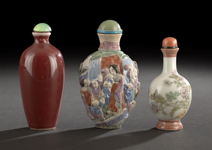 Appraisal: Group of Three Chinese Porcelain Snuff Bottles composed of a