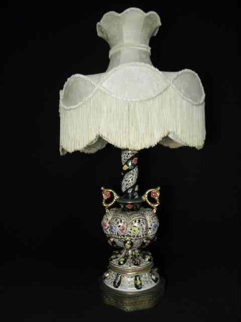 Appraisal: Italian Capodimonte reticulated floral porcelain table lamp Handled bottle vase-style