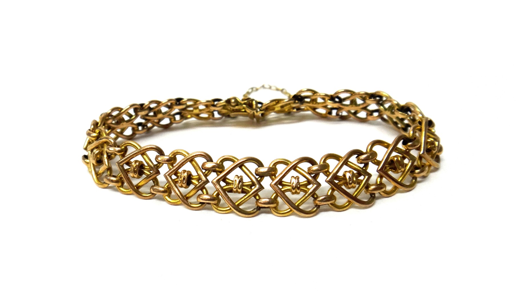 Appraisal: A gold multiple link bracelet on a snap clasp fitted