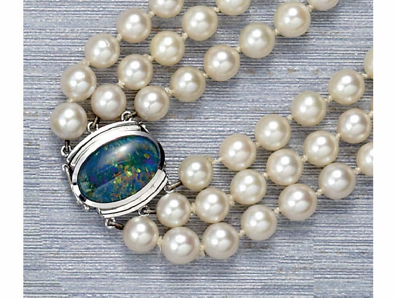 Appraisal: PEARL NECKLACE WITH BLACK OPAL DOUBLET CLASP Three strand cultured