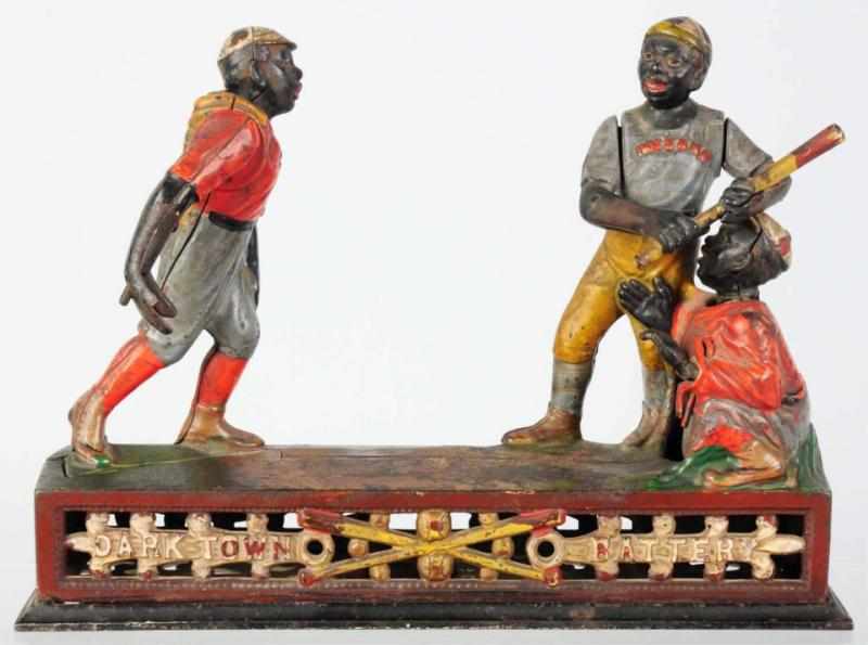 Appraisal: Cast Iron Darktown Battery Mechanical Bank Manufactured by J E