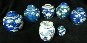 Appraisal: Five blue and white ginger jars decorated prunus blossom four