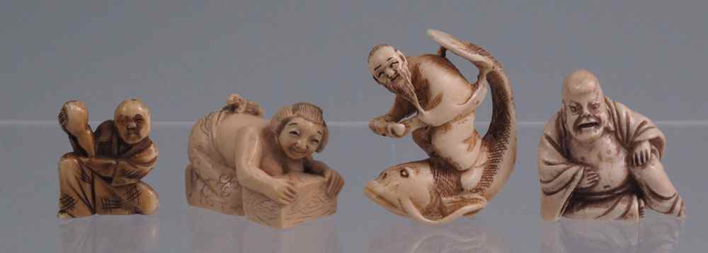 Appraisal: JAPANESE FIGURAL CARVED IVORY NETSUKE To include Bare breasted female