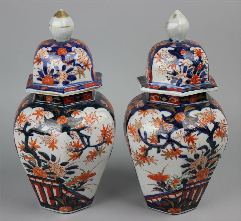 Appraisal: PAIR OF JAPANESE IMARI JARS WITH OCTAGONAL COVERS EDO PERIOD