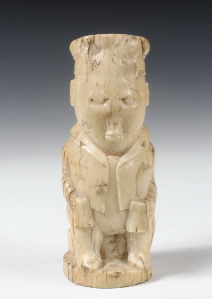 Appraisal: TH C AFRICAN BONE CARVING OF A EUROPEAN - Perhaps