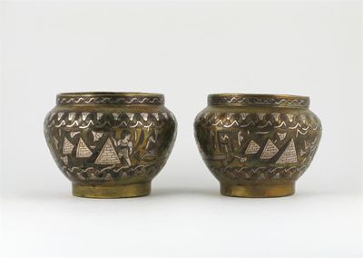 Appraisal: A pair of Cairoware brass bowls both decorated in silver