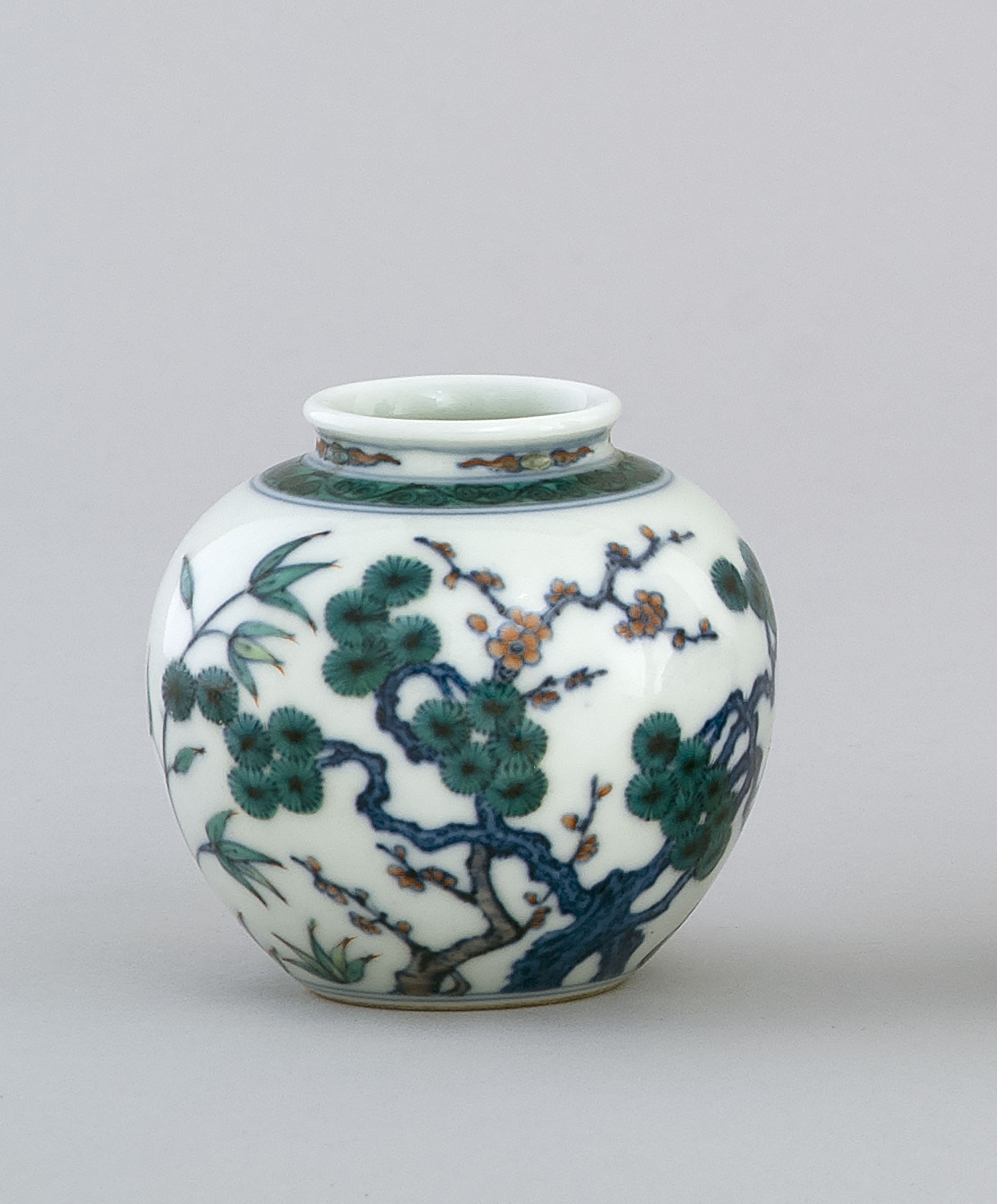 Appraisal: DOUCAI PORCELAIN JAR In ovoid form with pine tree bamboo