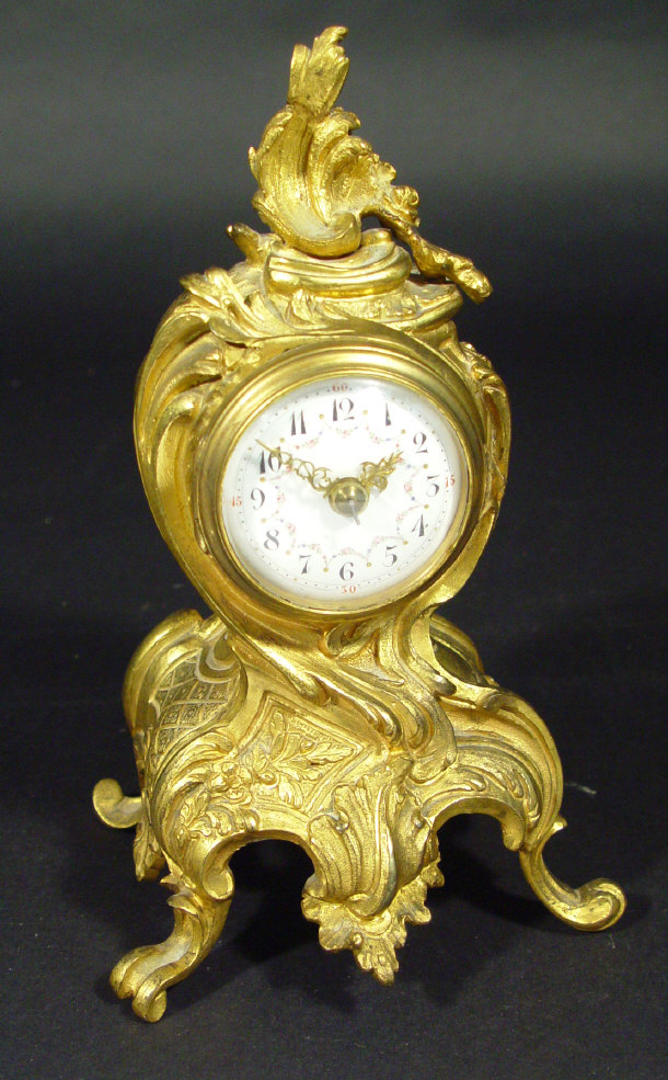 Appraisal: th Century gilt metal mantel clock with acanthus and floral