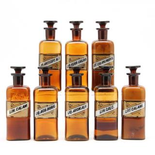 Appraisal: Set of Eight Amber Apothecary Bottles th century rectangular with