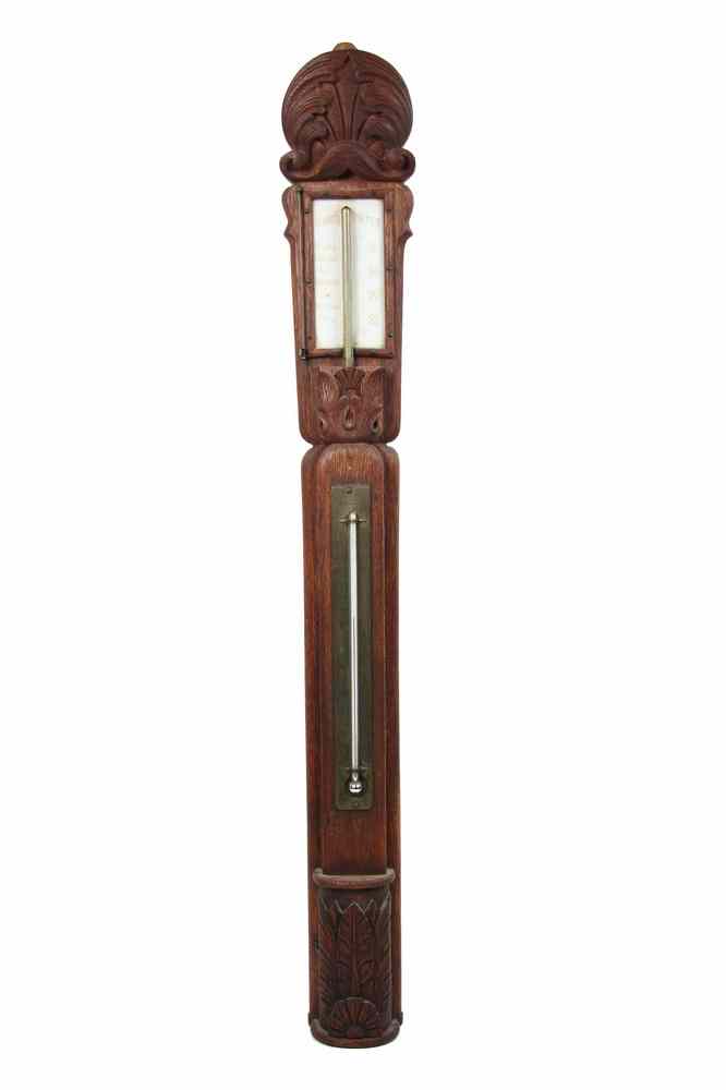 Appraisal: BAROMETER - Victorian carved solid oak barometer and thermometer with